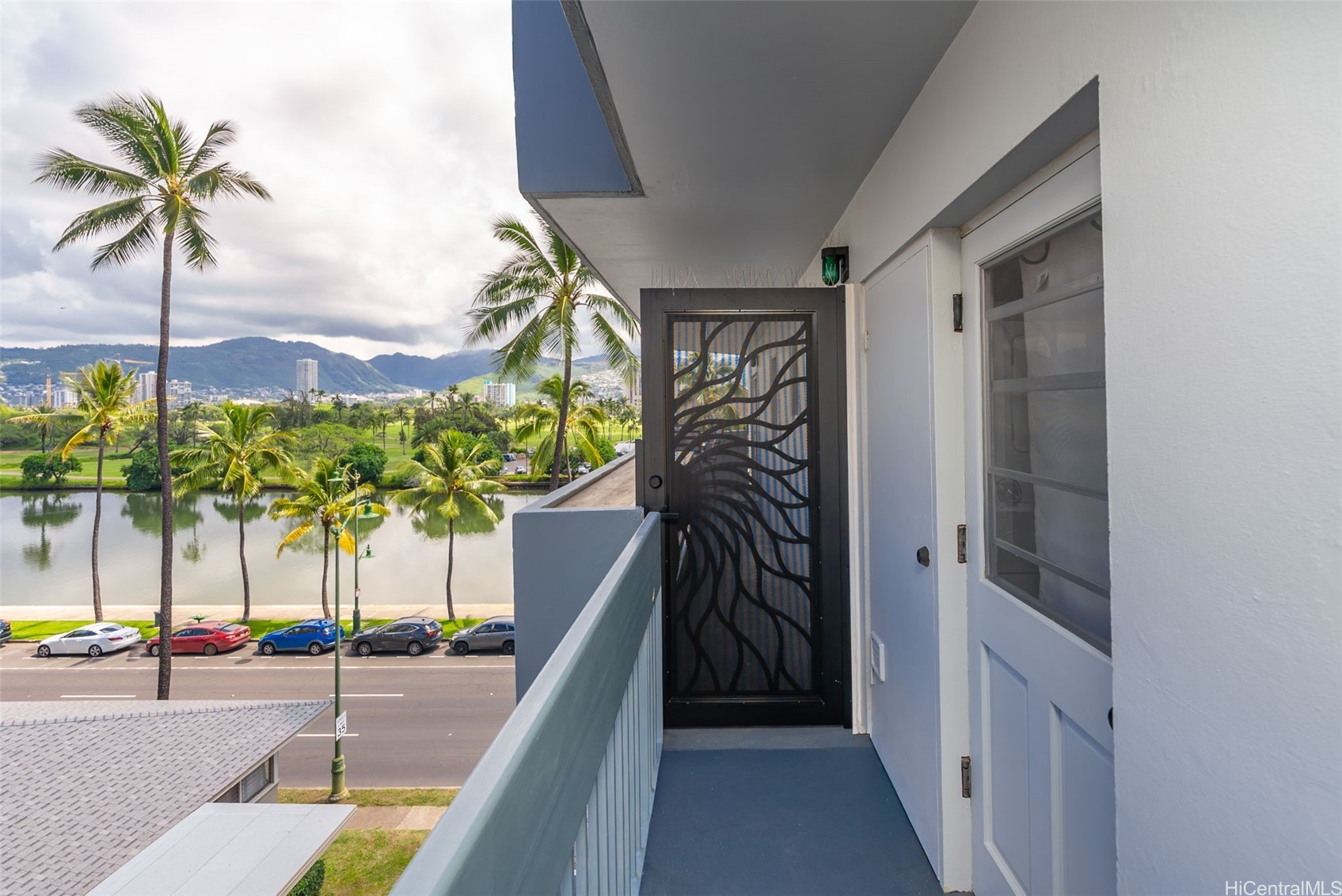 Mountain and Ala Wai Canal views from Waikiki condo for sale
