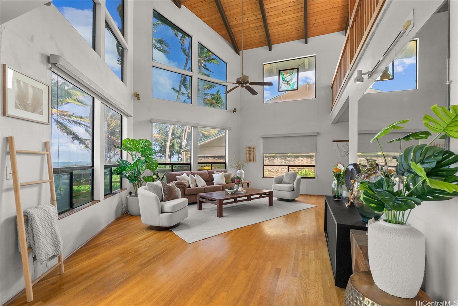 Large windows let in Oahu ocean views