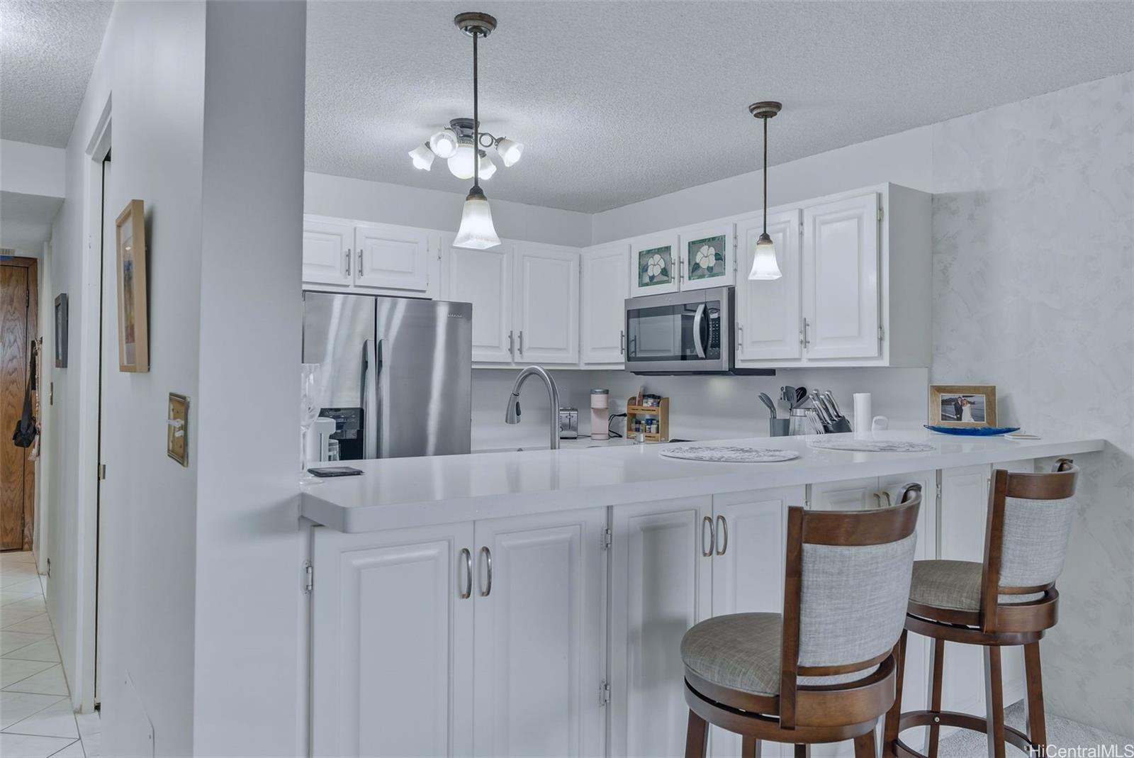 white kitchen in honolulu condo for sale