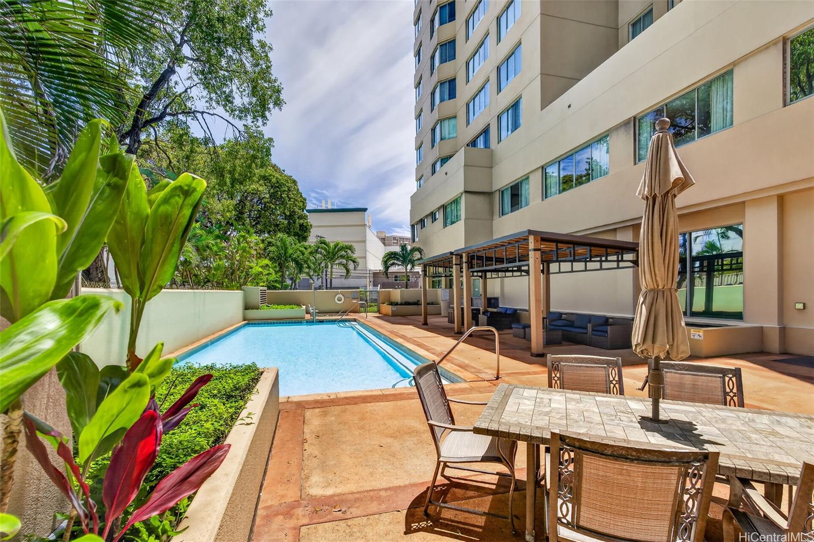 the pool is one of the many amenities at One Kalakaua in Honolulu Oahu