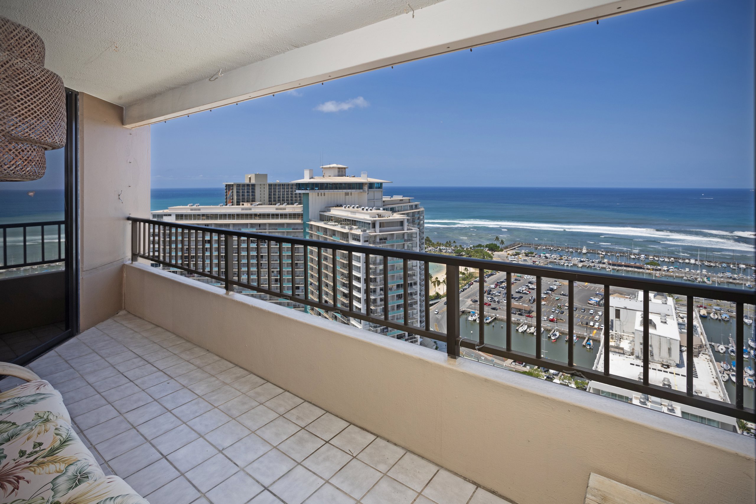 High-floor ocean and marina views from Discovery Bay #3401 in Honolulu