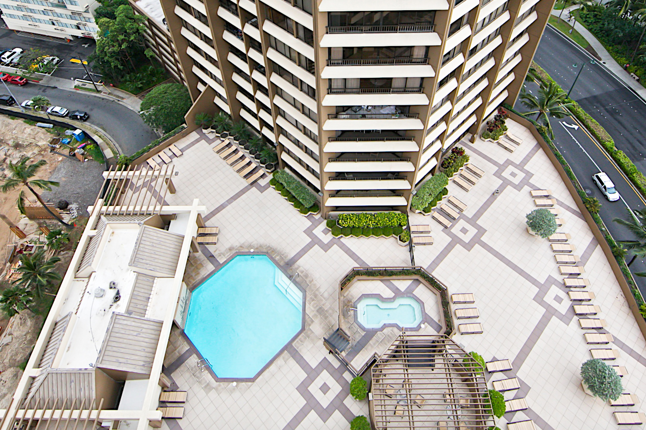 Swimming pool and recreation area at Discovery Bay in Waikiki