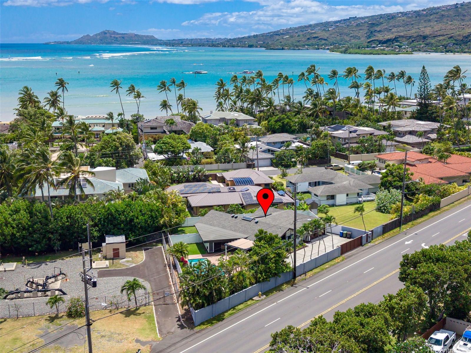 Aerial view of neighborhood with arror pointing to Portlock Oahu home 