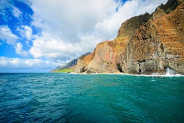Mortgage buy down Hawaii, Nā Pali Coast cliffs and turquoise water, Kauaʻi