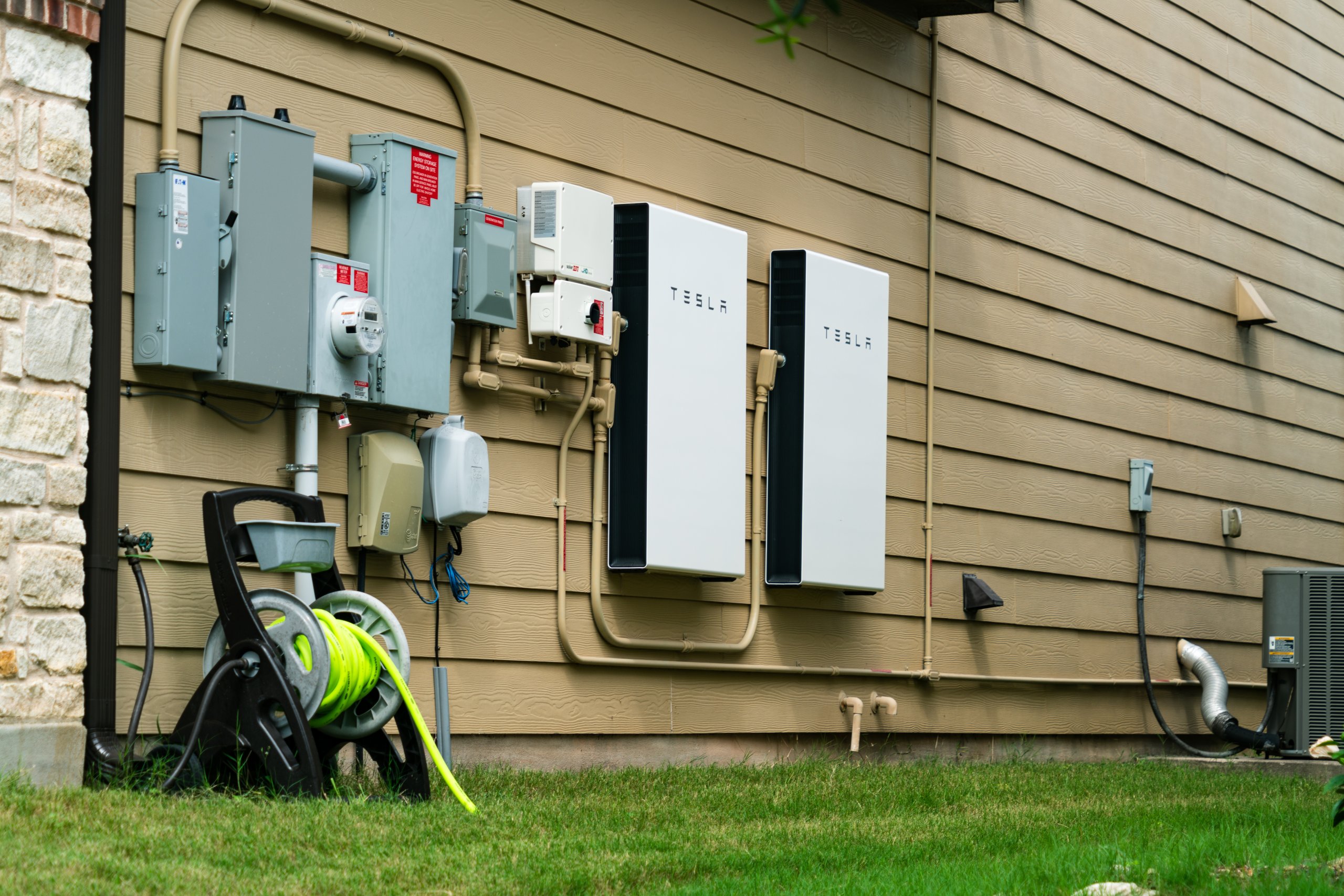 Tesla solar battery on house