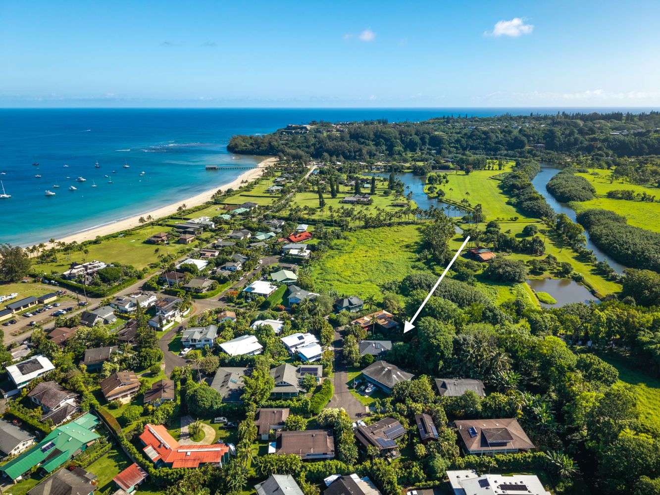 Arrow pointing to home for sale in hanalei palms