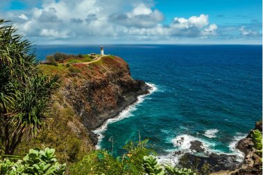 Kilauea Point Lighthouse above red sea cliffs and turquoise water on the North Shore, Kilauea, Kauaʻi