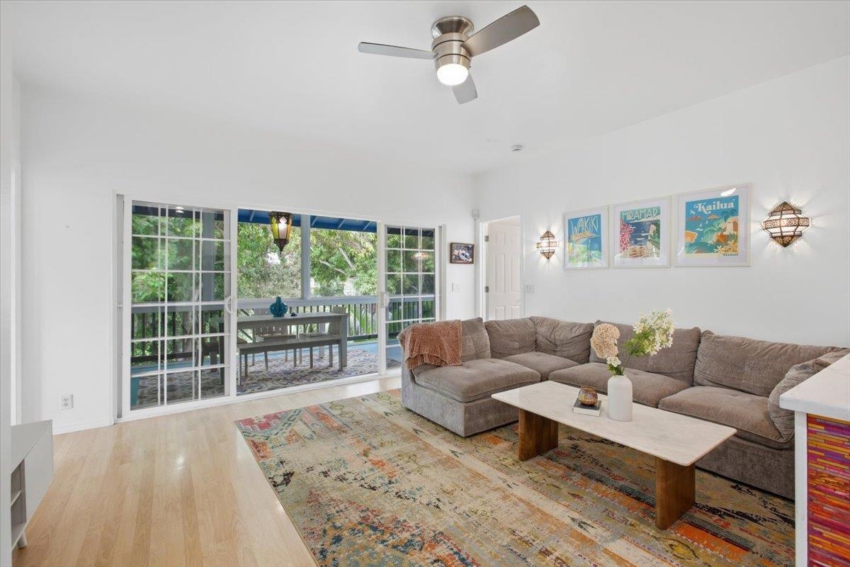 Living room with doors connecting to lanai in Kuau Maui
