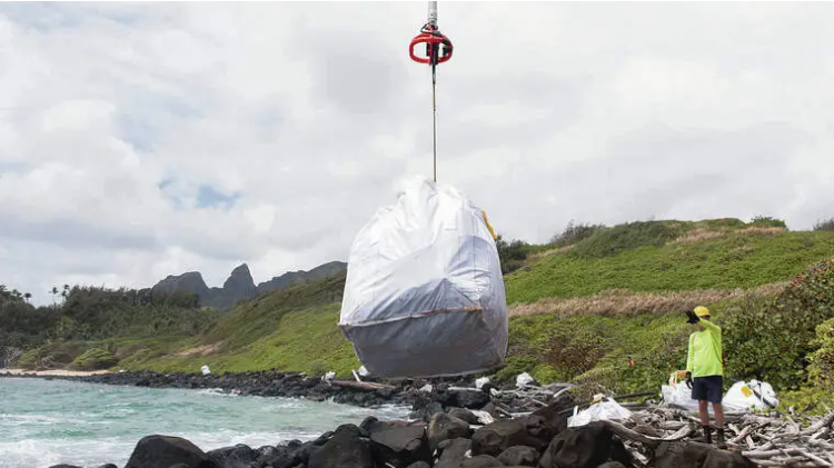 Trash clean up on hawaii beach