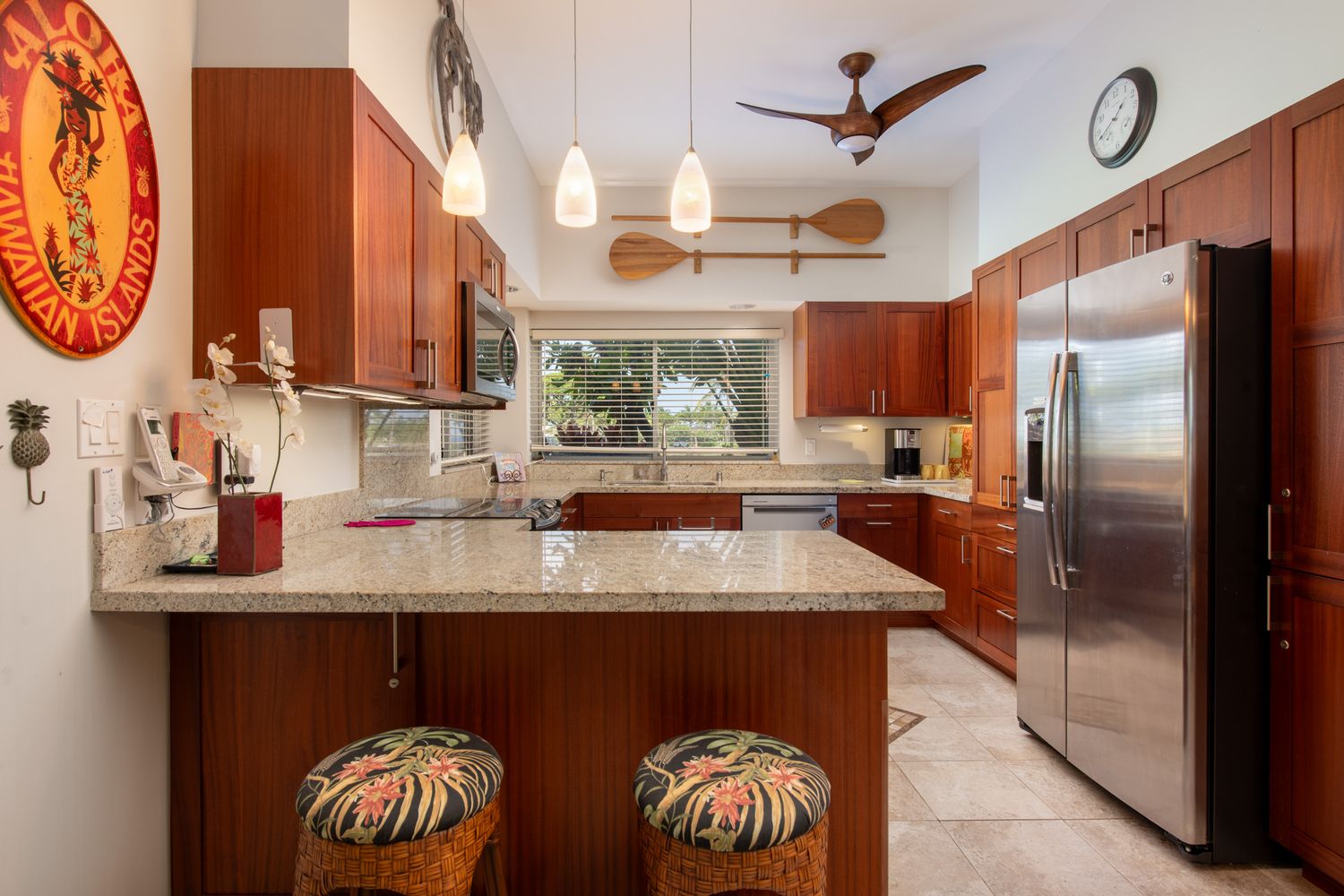 Cozy kitchen with warm wood cabinets and stainless steel appliances