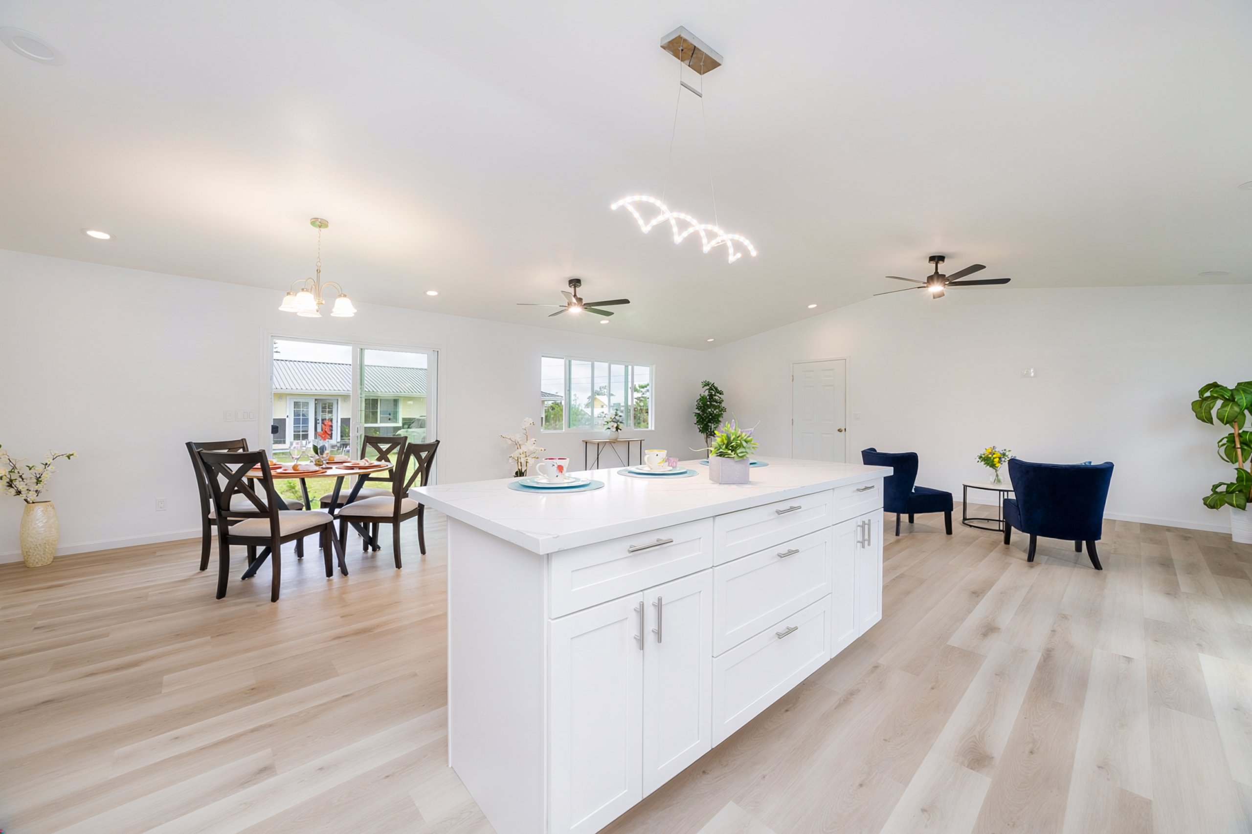 View from kitchen of open concept living and dining space