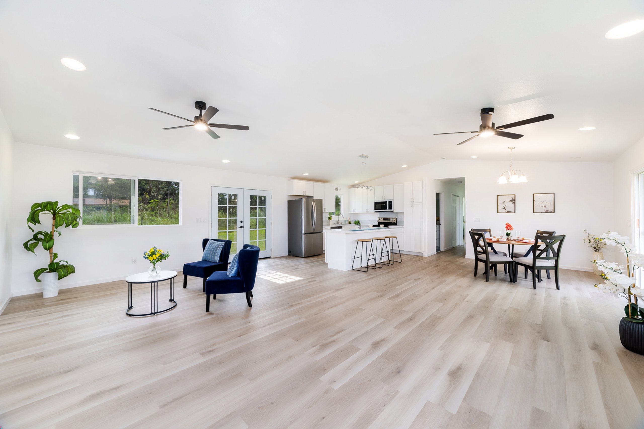 Open concept living space in ainaloa new home