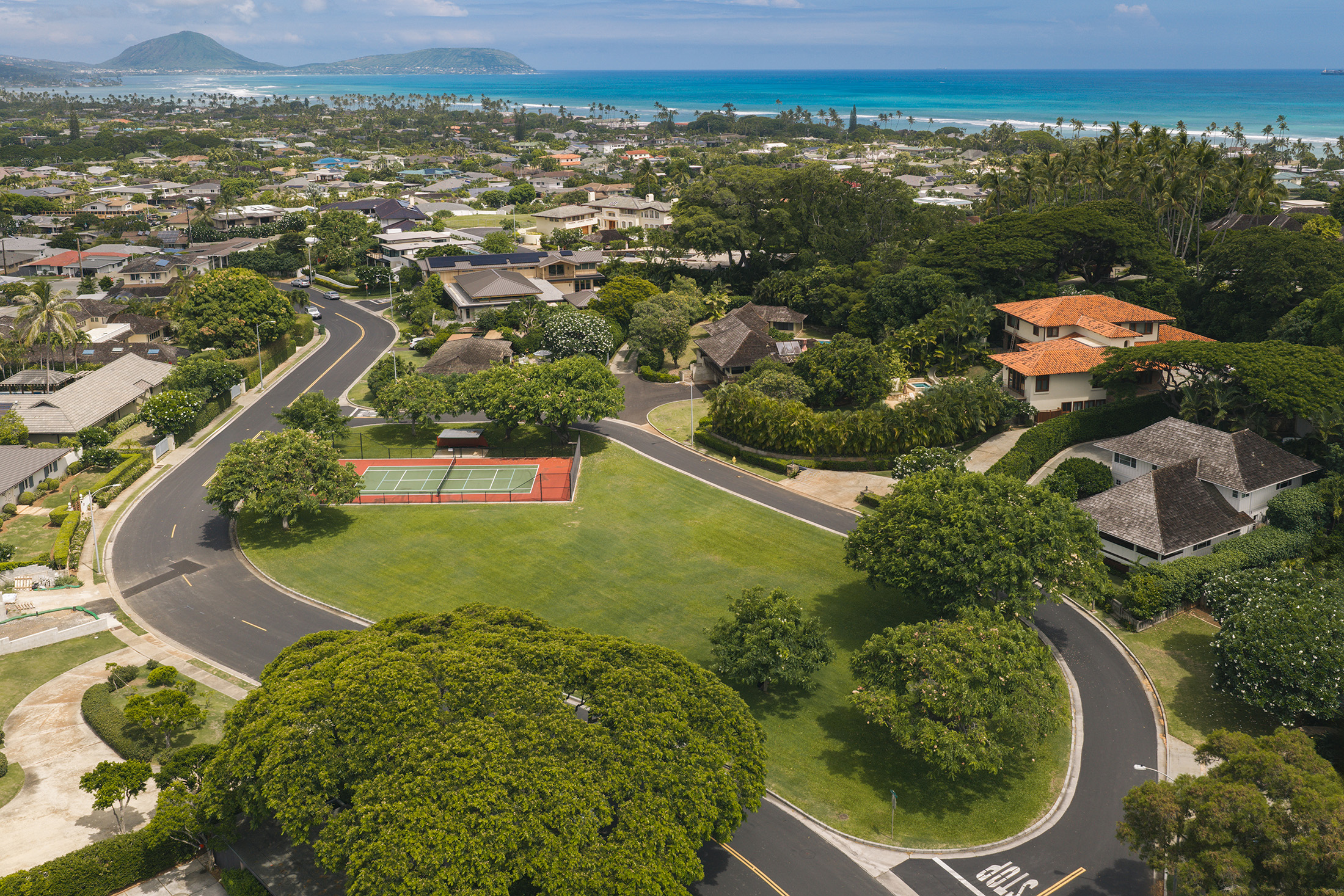 Aerial view of grounds and pickleball courts for Puu Panini residents