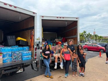 Volunteers helping Kau recover